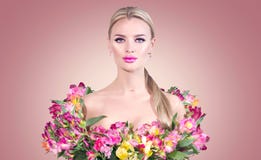 Beauty blonde model girl in summer dress made from colorful fresh flowers. Beautiful spring young romantic woman stock photos Beauty blonde model girl in summer dress made from colorful fresh flowers. Beautiful spring young romantic woman stock photos