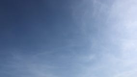 Beauty clouds against a blue sky background. Cloudy sky. Blue sky with clouds weather, nature cloud. White clouds, blue sky and su stock video footage Beauty clouds against a blue sky background. Cloudy sky. Blue sky with clouds weather, nature cloud. White clouds, blue sky and su stock video footage