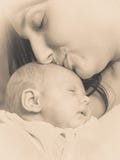 Mother holding her little newborn baby Stock Photo Mother holding her little newborn baby Stock Photo