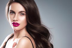 Beauty Woman face Portrait. Beautiful Spa model Girl with Perfect Fresh Clean Skin model female looking at camera and smiling on stock image Beauty Woman face Portrait. Beautiful Spa model Girl with Perfect Fresh Clean Skin model female looking at camera and smiling on stock image