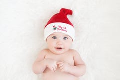 Bebé lindo con Santa Hat imagen de archivo Bebé lindo con Santa Hat imagen de archivo