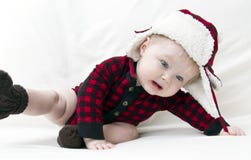 Bebê amedrontado do Natal que cai sobre fotos de stock Bebê amedrontado do Natal que cai sobre fotos de stock