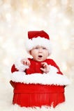 Bebê feliz do Natal de Santa imagens de stock Bebê feliz do Natal de Santa imagens de stock