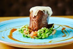 Beef Fillet With A Crust Of Parmesan On A Bed Of Arugula And Eggplant Royalty Free Stock Photo Beef Fillet With A Crust Of Parmesan On A Bed Of Arugula And Eggplant Royalty Free Stock Photo