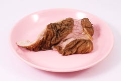 Beef tripe on pink dish stock image Beef tripe on pink dish stock image