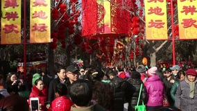 Beijing,China-Feb 2, 2014: Thousands of people visit temple fair in Ditan Park during Chinese Spring Festival in Beijing,. China3 Beijing,China-Feb 2, 2014: Thousands of people visit temple fair in Ditan Park during Chinese Spring Festival in Beijing,. China3