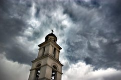 Bell Tower Under Dramatic Sky Stock Photo