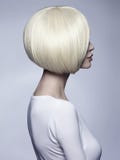 Belle femme avec la coiffure peu commune de plomb images stock Belle femme avec la coiffure peu commune de plomb images stock