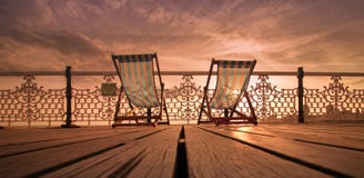 Belles chaises longues de Brighton image libre de droits Belles chaises longues de Brighton image libre de droits