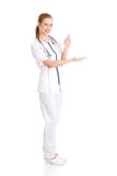 Bello medico o infermiere caucasico sta presentando uno PS astratto fotografia stock libera da diritti Bello medico o infermiere caucasico sta presentando uno PS astratto fotografia stock libera da diritti