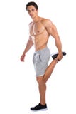 Ben för elasticitet för kroppsbyggarebodybuildingmuskler som sträcker exercis royaltyfri bild Ben för elasticitet för kroppsbyggarebodybuildingmuskler som sträcker exercis royaltyfri bild