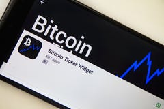 Berlin, Germany - November 19, 2017: Bitcoin Ticker Widget application on screen of modern smartphone close-up royalty free stock photo Berlin, Germany - November 19, 2017: Bitcoin Ticker Widget application on screen of modern smartphone close-up royalty free stock photo
