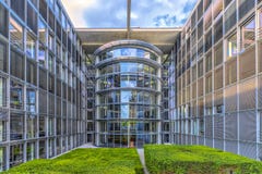 Berlin Germany 16th May 2018 view of one of the parliament buildings with its many glass windows and facades in the government sec royalty free stock photography Berlin Germany 16th May 2018 view of one of the parliament buildings with its many glass windows and facades in the government sec royalty free stock photography
