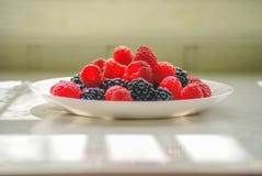 Berries on a plate. stock photos Berries on a plate. stock photos