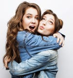 Best Friends Teenage Girls Together Having Fun, Posing Emotional On White Background, Besties Happy Smiling, Lifestyle Stock Photo