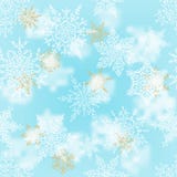 Bianco di Natale e fiocchi di neve dell'oro sul fondo del blu della sfuocatura Modello di vacanza invernale Cartolina d'auguri Il Fotografia Stock Bianco di Natale e fiocchi di neve dell'oro sul fondo del blu della sfuocatura Modello di vacanza invernale Cartolina d'auguri Il Fotografia Stock