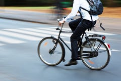 Bicycle Rider In City Traffic In Motion Blur Stock Photography Bicycle Rider In City Traffic In Motion Blur Stock Photography