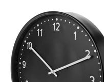 Big black clock on white background. Time change concept Royalty Free Stock Image Big black clock on white background. Time change concept Royalty Free Stock Image