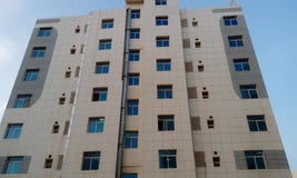 High rise building having big apartments with front elevation view stock photography High rise building having big apartments with front elevation view stock photography
