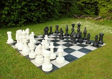 Big Outdoor Chess In Green Lawn Stock Photo