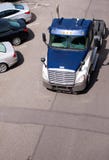 Big rig semi truck tractor running on the parking place royalty free stock photo Big rig semi truck tractor running on the parking place royalty free stock photo