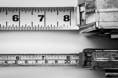Big and small tape measure tools stock photos Big and small tape measure tools stock photos