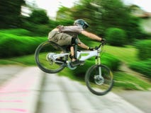 Bike rider at urban downhill competition