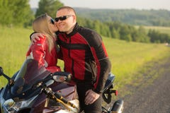 https://thumbs.dreamstime.com/t/biker-man-woman-sitting-motorcycle-kiss-men-women-55606014.jpg