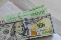 Billets de banque américains du dollar et d'euro photographie stock Billets de banque américains du dollar et d'euro photographie stock
