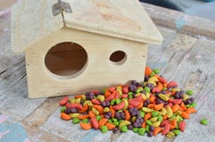 Bird food and little wood house royalty free stock image Bird food and little wood house royalty free stock image