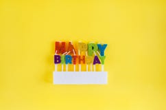 Birthday candles isolated on the yellow