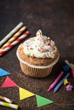 Birthday cupcake with cream and decorations stock photo Birthday cupcake with cream and decorations stock photo