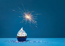 Birthday Cupcake on blue with sparkler