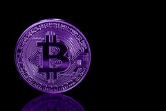 Bitcoin on black background with reflection. Ultraviolet image