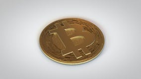 Bitcoin Crypto Currency-Gold Laying Down stock photo Bitcoin Crypto Currency-Gold Laying Down stock photo