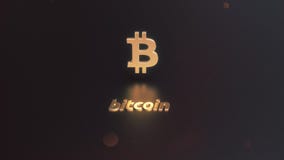 Bitcoin cryptocurrency golden logo on the dark background stock illustration Bitcoin cryptocurrency golden logo on the dark background stock illustration
