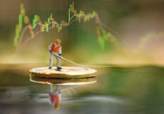 Bitcoin trading market data chart forex graph board with Figurines working Mining bitcoin digging stock image Bitcoin trading market data chart forex graph board with Figurines working Mining bitcoin digging stock image