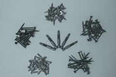 Bits for screwdriver and cogs. royalty free stock photography Bits for screwdriver and cogs. royalty free stock photography