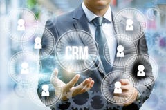 Biznesmen pokazuje CRM obraz royalty free Biznesmen pokazuje CRM obraz royalty free