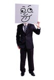 Biznesmen trzyma śmiesznego wyrażeniowego billboard fotografia stock Biznesmen trzyma śmiesznego wyrażeniowego billboard fotografia stock