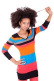 Black African American teenage girl holding her afro hair Stock Photography Black African American teenage girl holding her afro hair Stock Photography