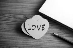 Black And White Paper Heart With Notebook Royalty Free Stock Image