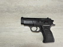 Black brutal tanfoglio pistol chambered in 9mm stock photo Black brutal tanfoglio pistol chambered in 9mm stock photo