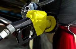 Black car fueling petrol at station stock photo Black car fueling petrol at station stock photo