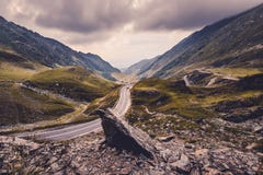 Black Car on Road Near Mountains Stock Photo Black Car on Road Near Mountains Stock Photo