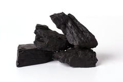 Black coal closeup on a white background. royalty free stock images Black coal closeup on a white background. royalty free stock images