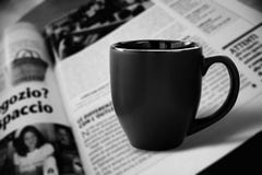 Black Cup And Newspaper Royalty Free Stock Photos