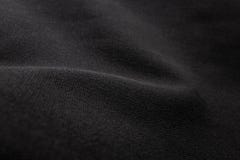 The texture of gray fabric textile upholstery of furniture