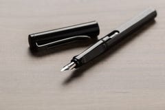 Black fountain pen on table royalty free stock photo Black fountain pen on table royalty free stock photo