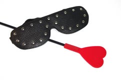 Black leather mask with metal rivets and red crop isolated on white royalty free stock photography Black leather mask with metal rivets and red crop isolated on white royalty free stock photography